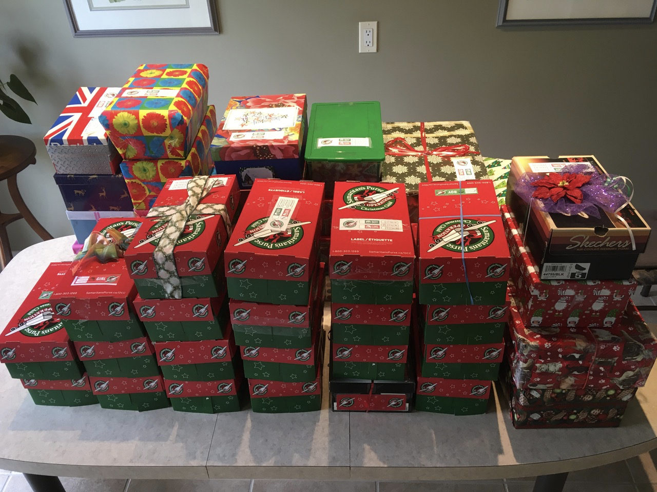 A stack of shoeboxes packed for Operation Christmas Child