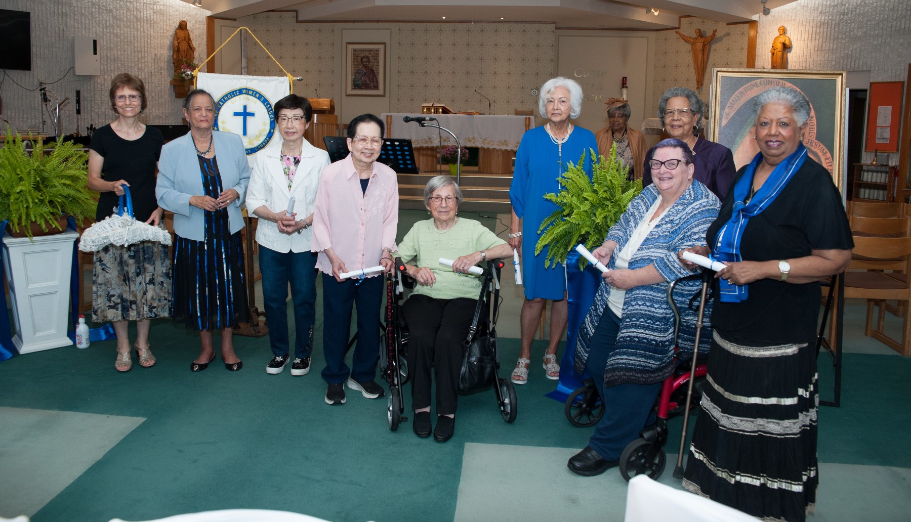 Members receiving pins for 10, 25, and 30 years of service