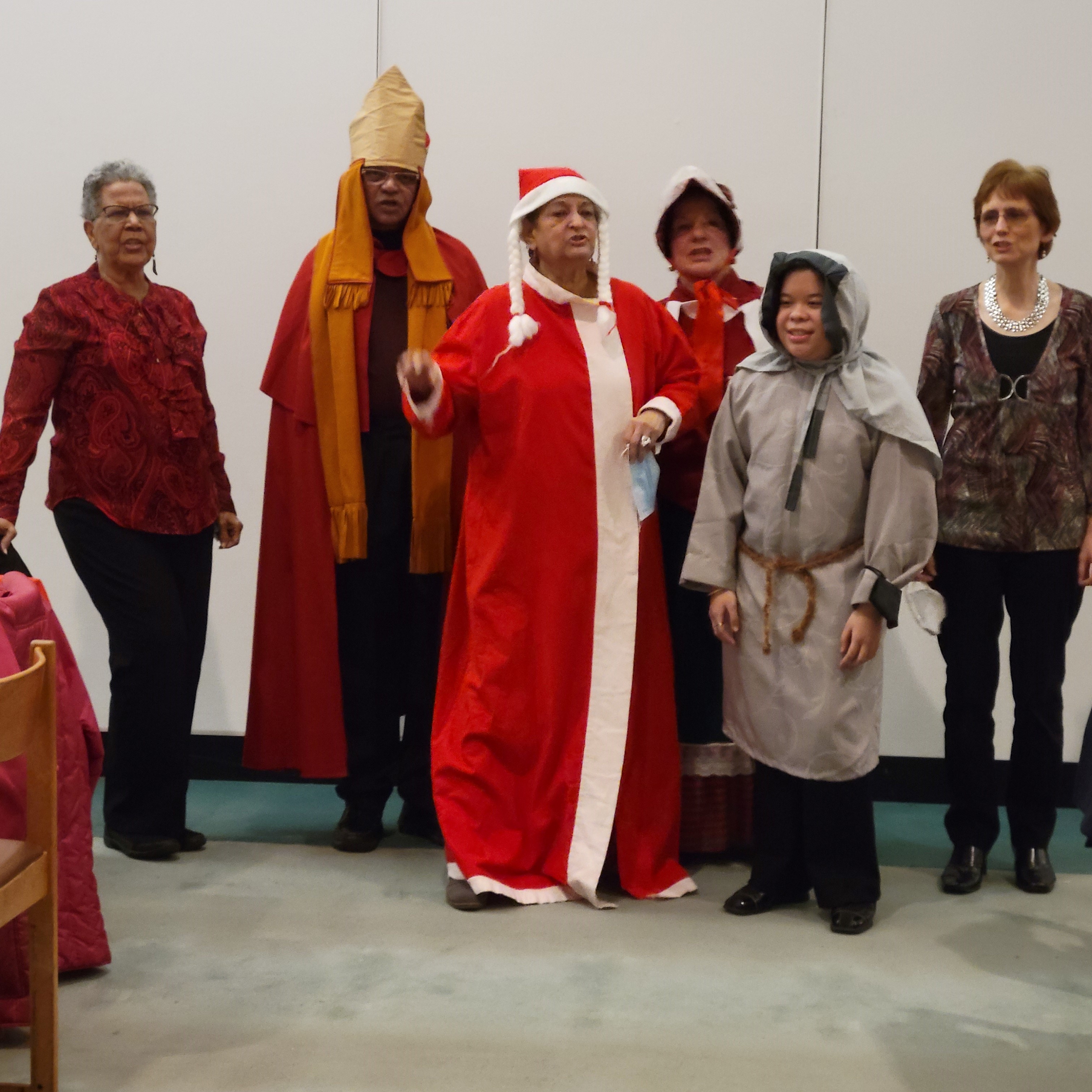 Participants dressed as Mrs Claus, a wise man, and elf, and a shepherd