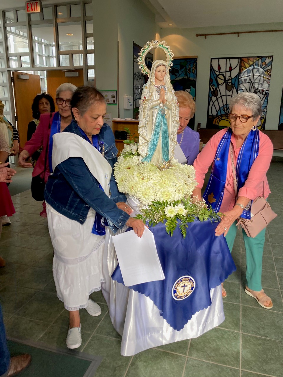 CWL members with statue of Our Lady