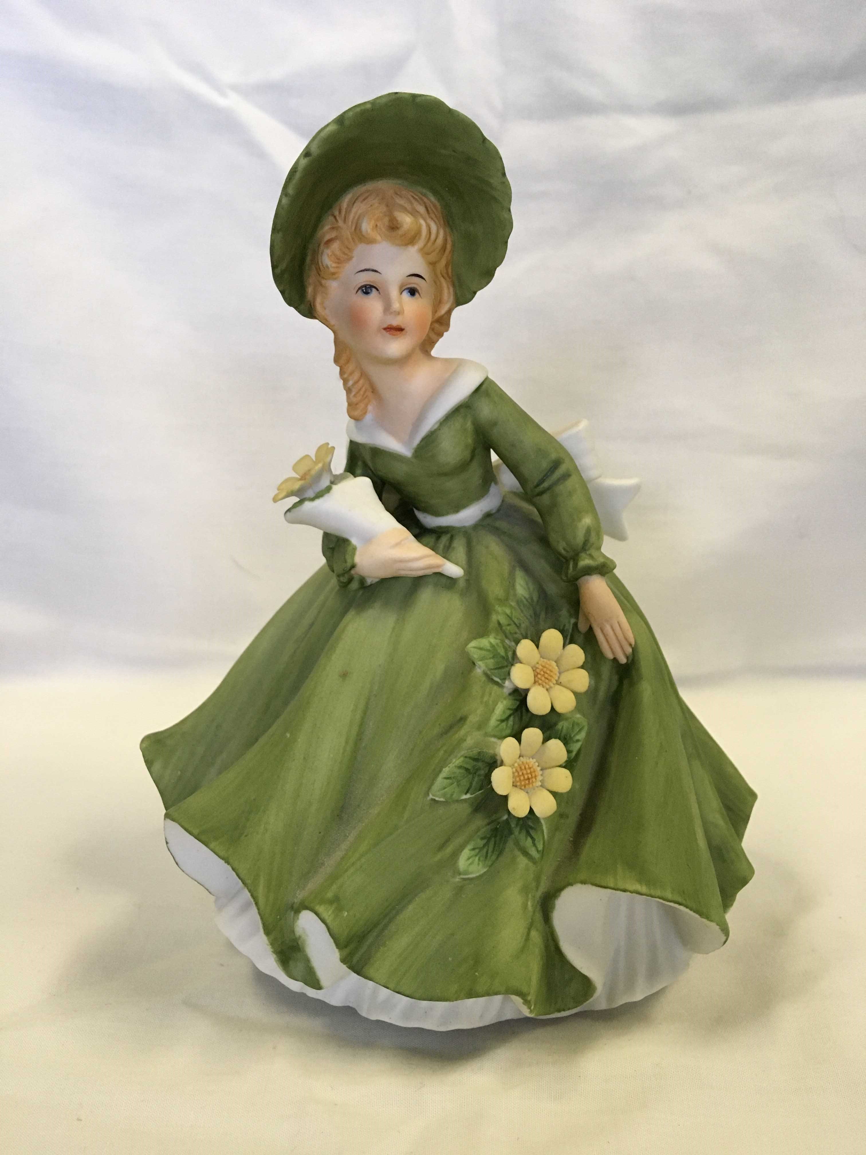 Porcelain lady in green